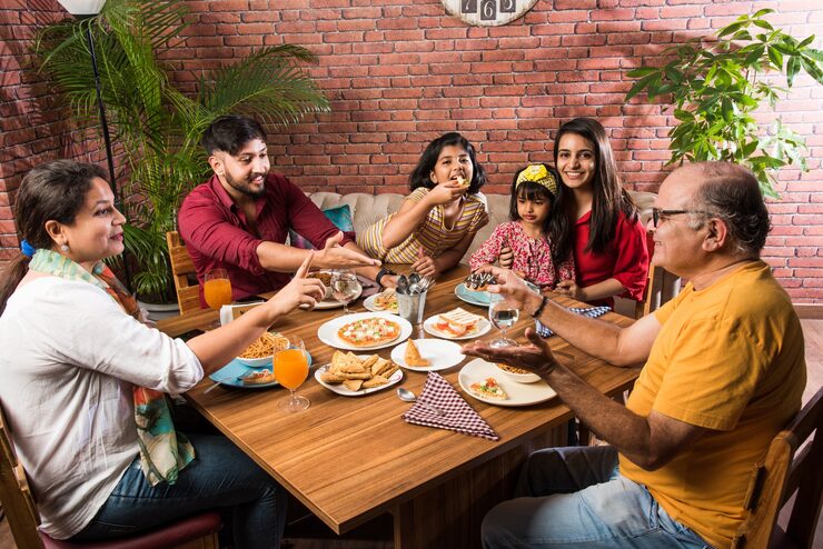 grandparents, parents, and Gen Z—sharing laughter and delicious meals together at a family restaurant in Jadavpur.