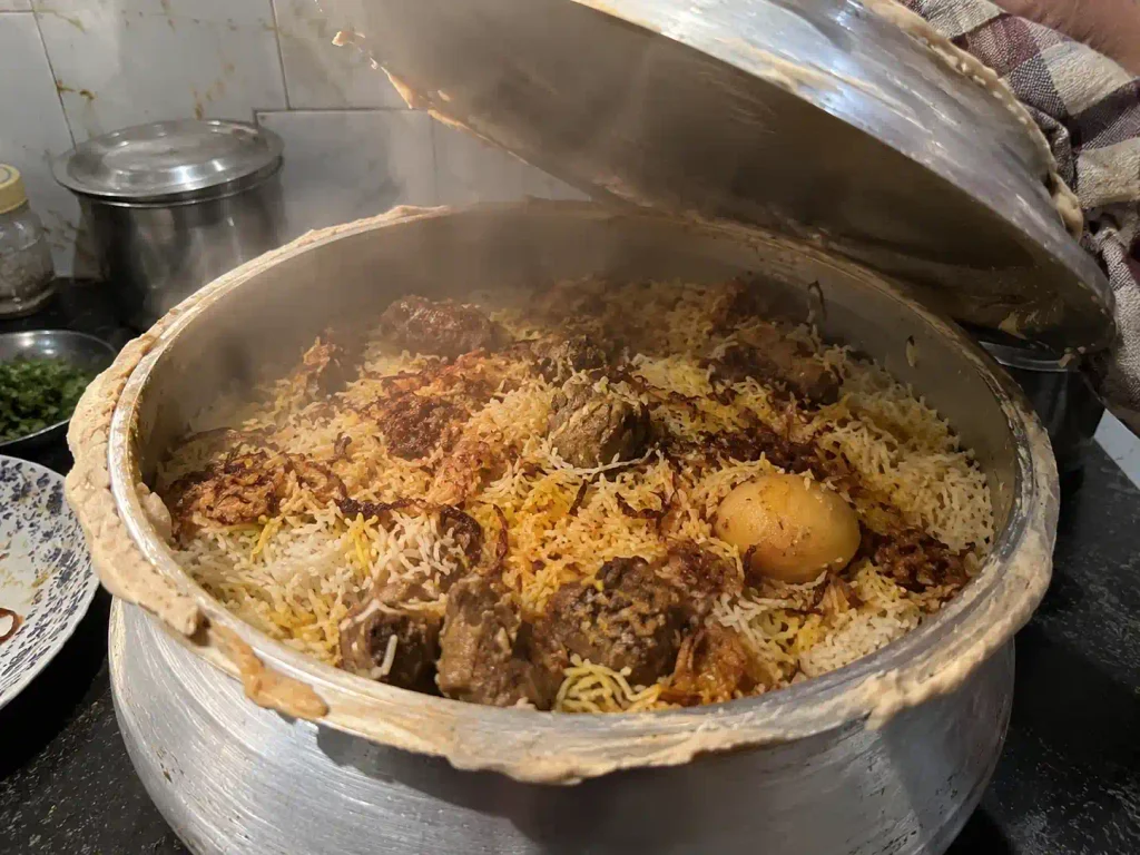 Kolkata mutton biryani just opened after dum, steam rising