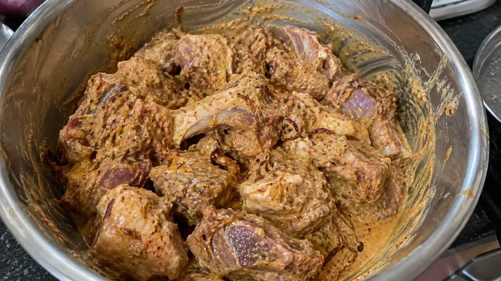 Mutton marinated in yoghurt and spices for Kolkata biryani